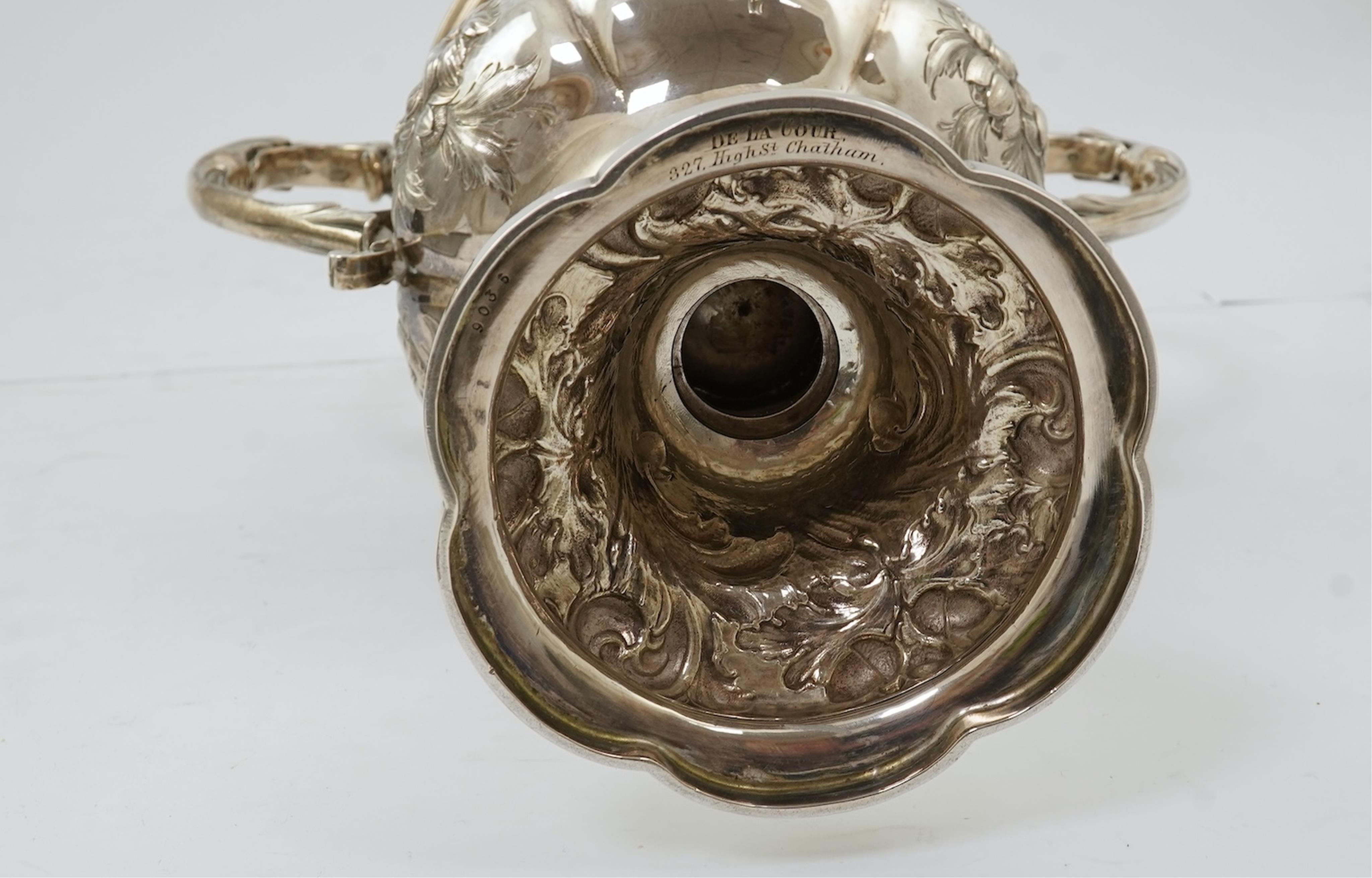 A Victorian embossed silver two handled presentation trophy cup by George John Richards & Edward Charles Brown